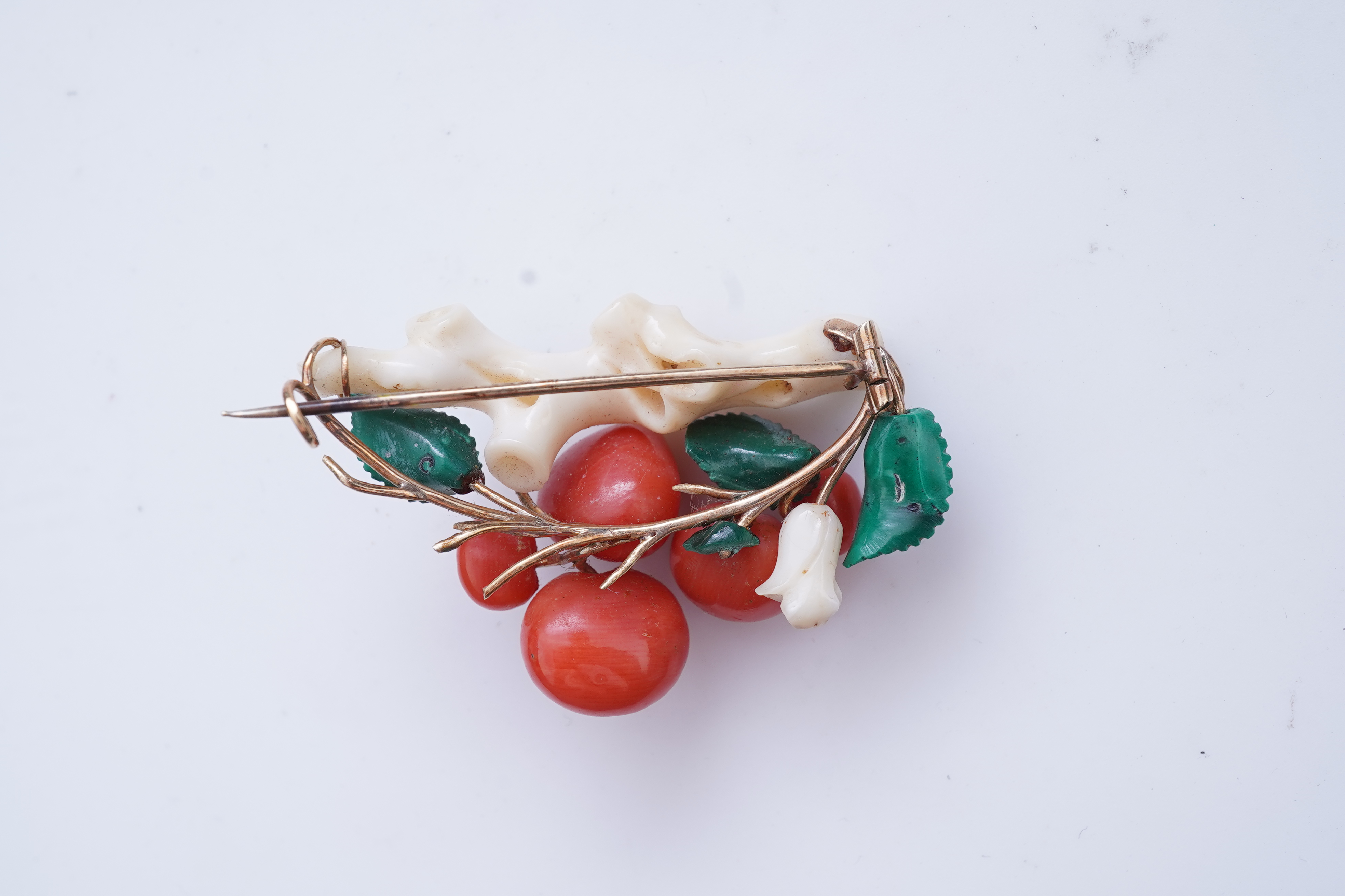 A rare coral and malachite demi-parure, mid 19th century and later